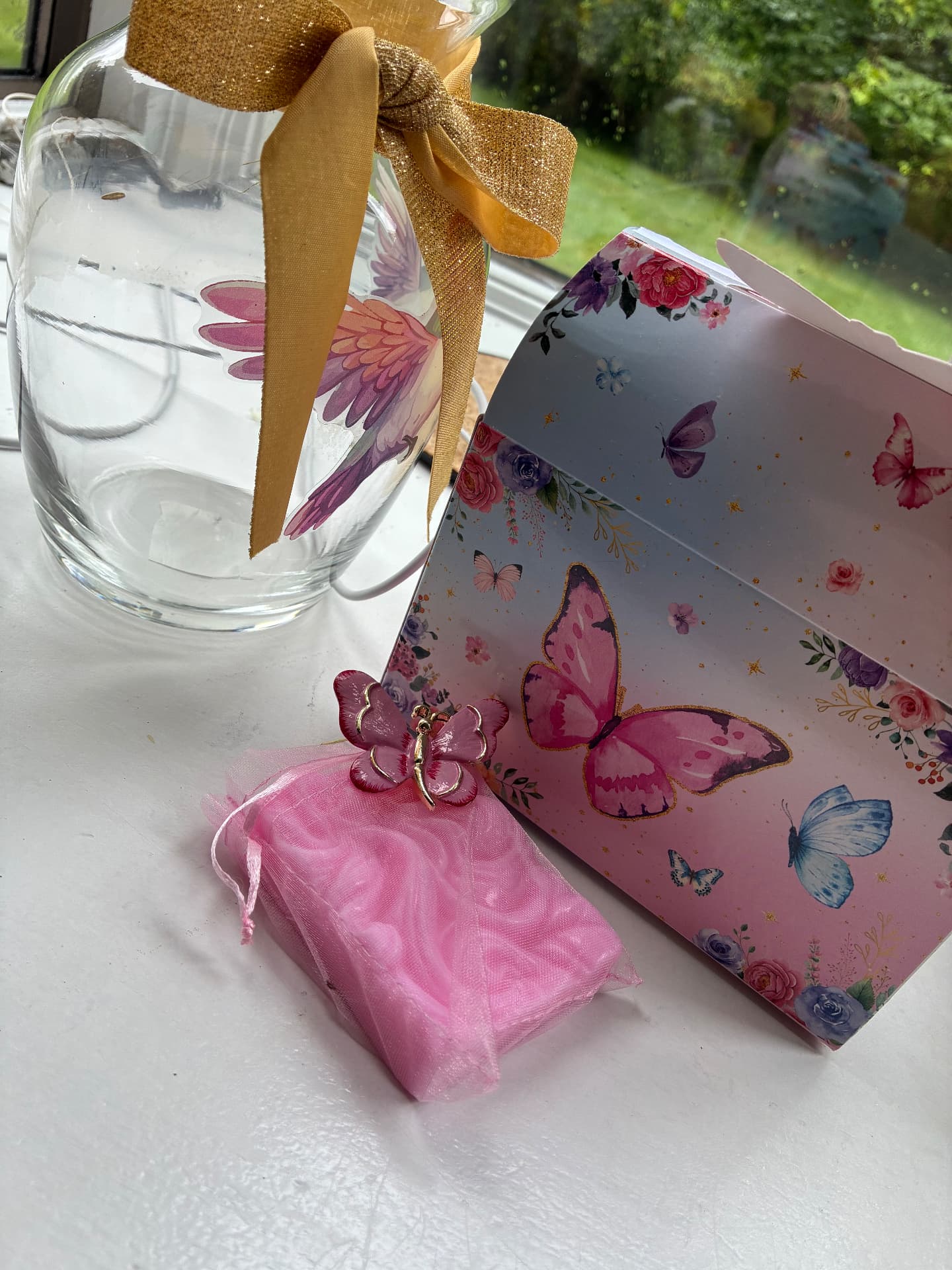 Pink Ocean Wave butterfly soap wrapped in a pink organza pouch with a gold-trim butterfly charm